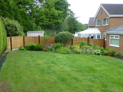 Slotted concrete fence post - fence,